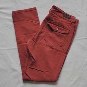 Levi's mid rise skinny jeans rust color